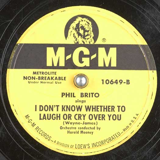 I Don't Know Whether To Laugh Or Cry Over You, MGM #10649-B, Phil Brito Harol Mooney Conductor record label
        
